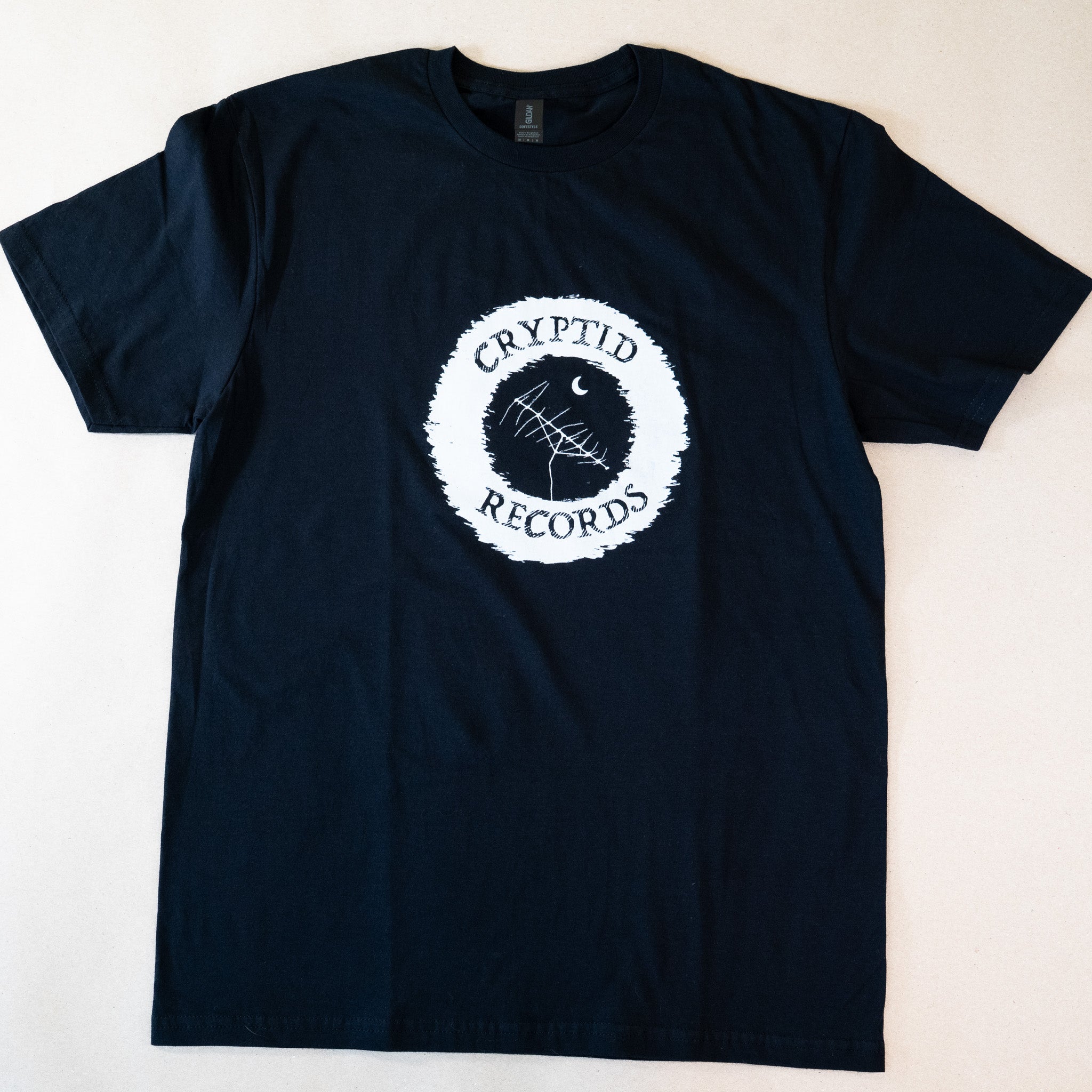 Cryptid Records logo screen print on black tee
