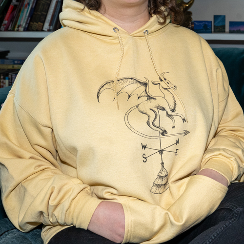 Model wearing Batsto (Jersey Devil) hoodie from Cryptid Records in yellow