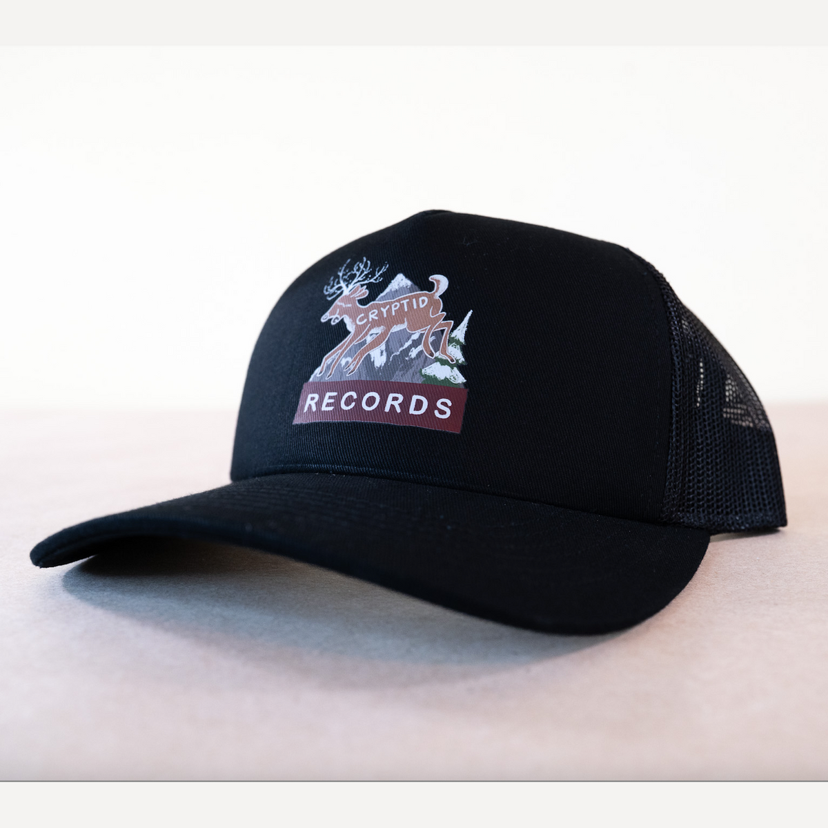 Reina deer trucker hat in black from Cryptid Records