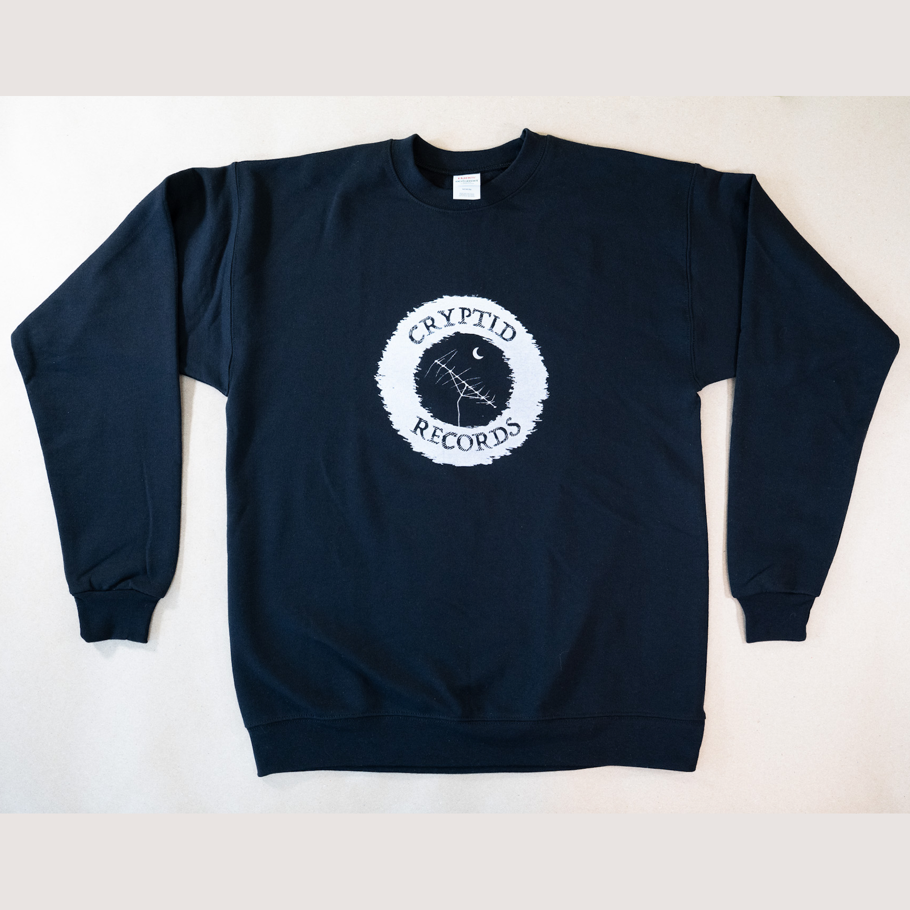 The Beacon Antenna black crewneck sweatshirt from Cryptid Records reading "Cryptid Records"