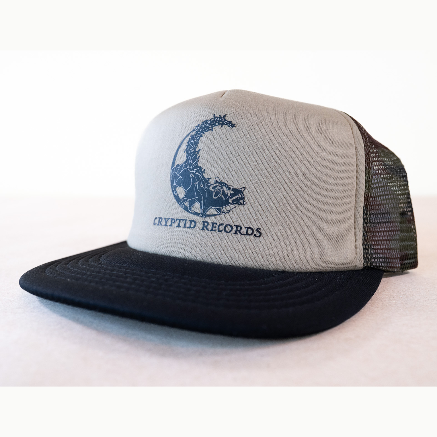 Gizmo Treasure Tracker camo snapback trucker hat, close up view