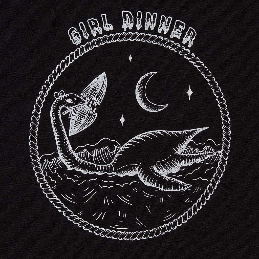 Close-up of Plesia Girl Dinner screen print detail, black shirt